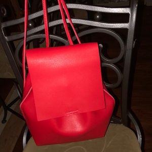 Red long leather backpack